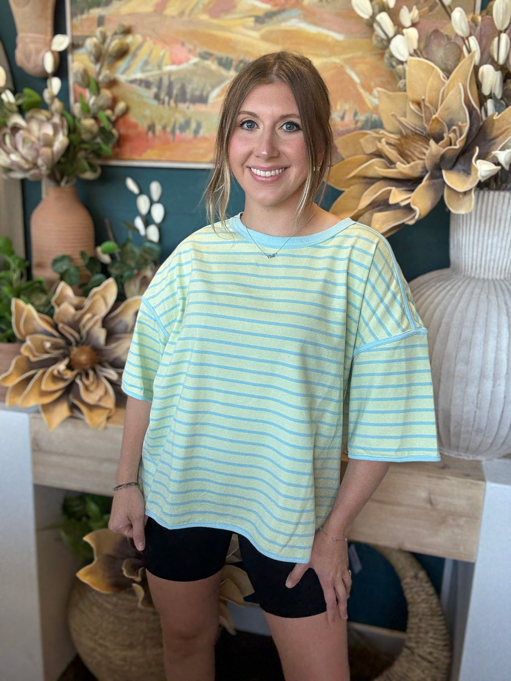 women's mint green and blue striped oversized knit top with relaxed fit and wide sleeves