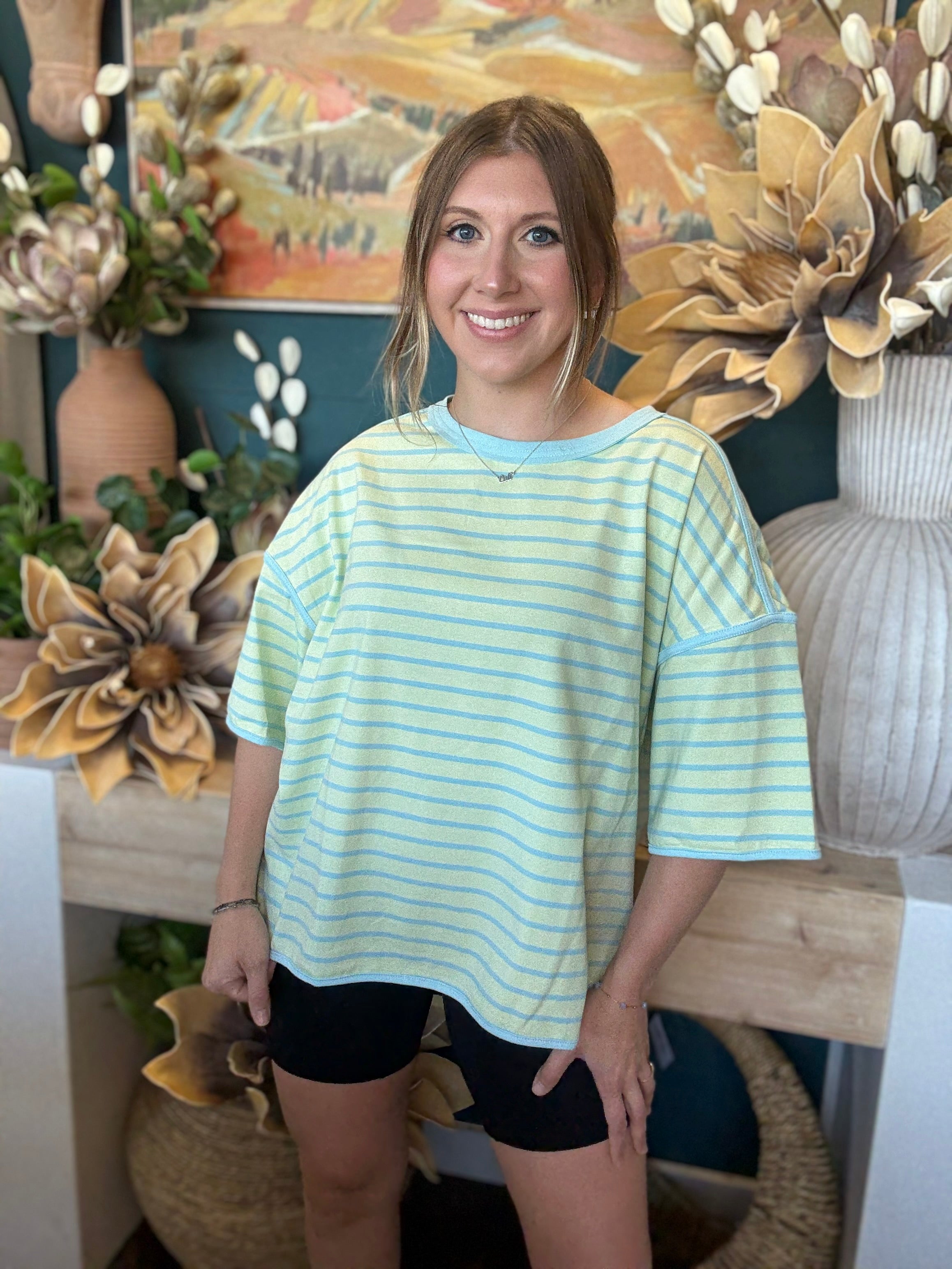women's mint green and blue striped oversized knit top with relaxed fit and wide sleeves
