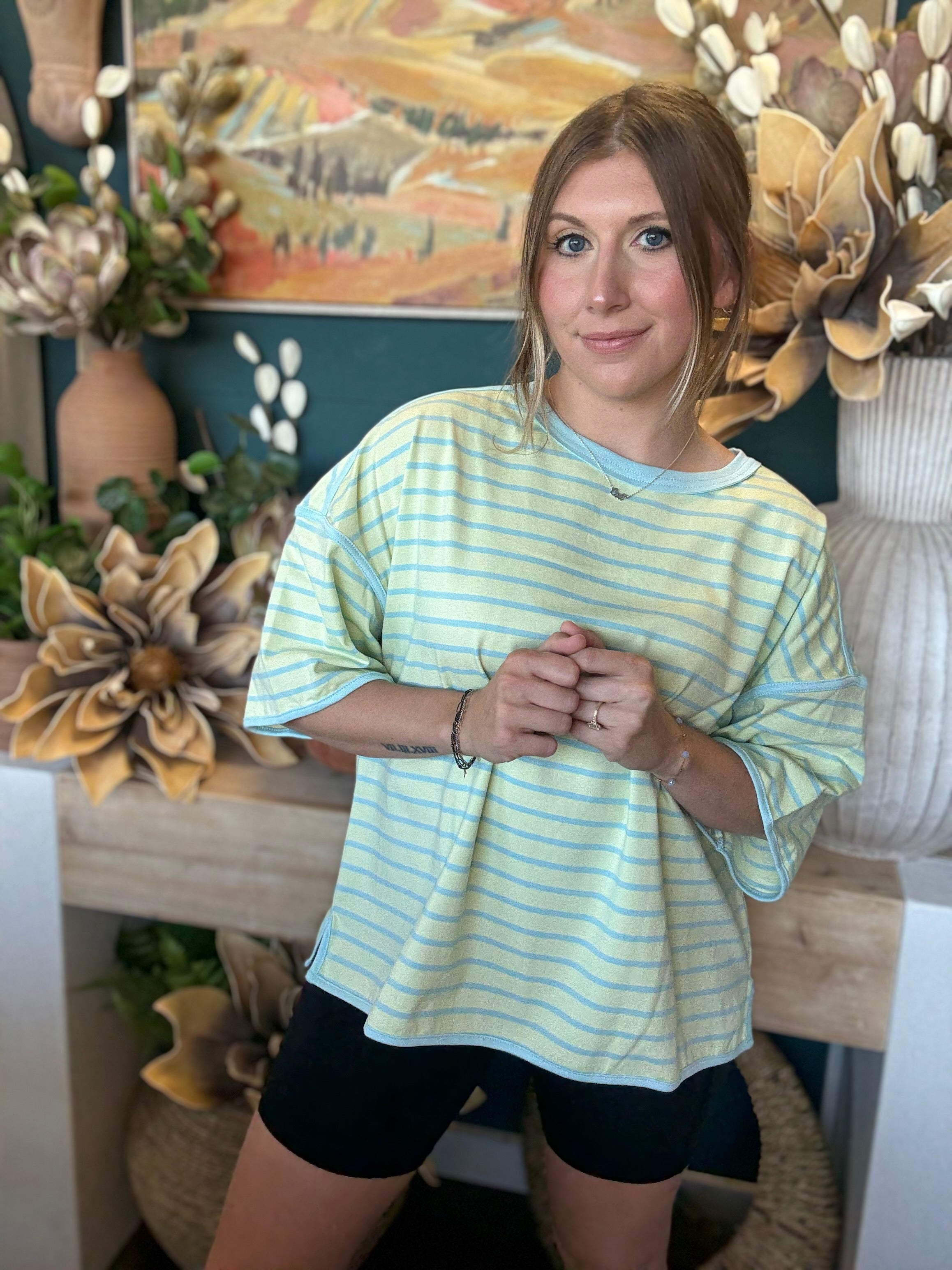 women's mint green and blue striped oversized knit top with relaxed fit and wide sleeves