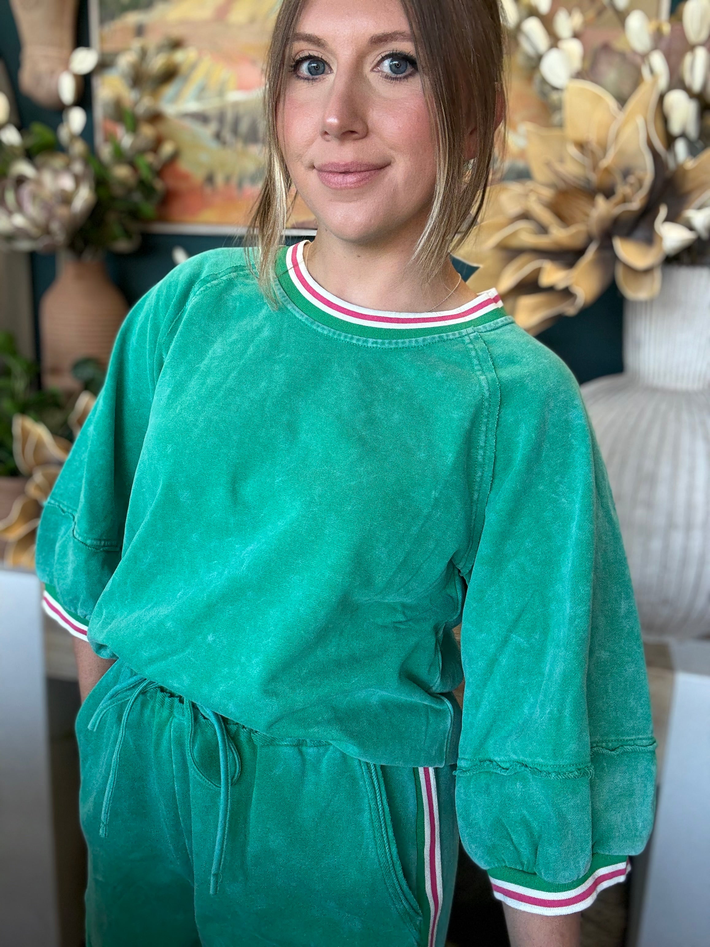 women's green matching short set with balloon sleeves and pink white striped trim