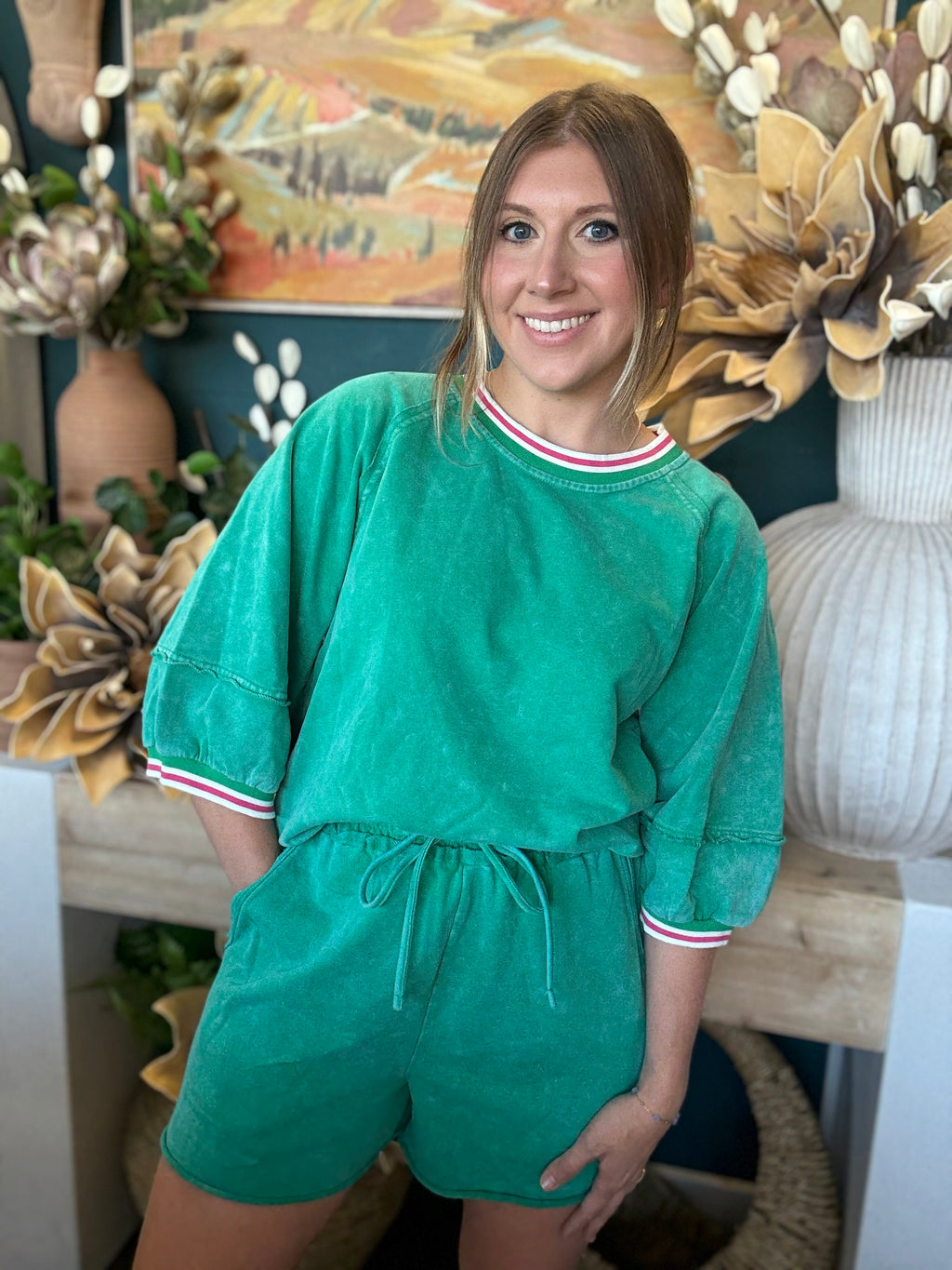 women's green matching short set with balloon sleeves and pink white striped trim