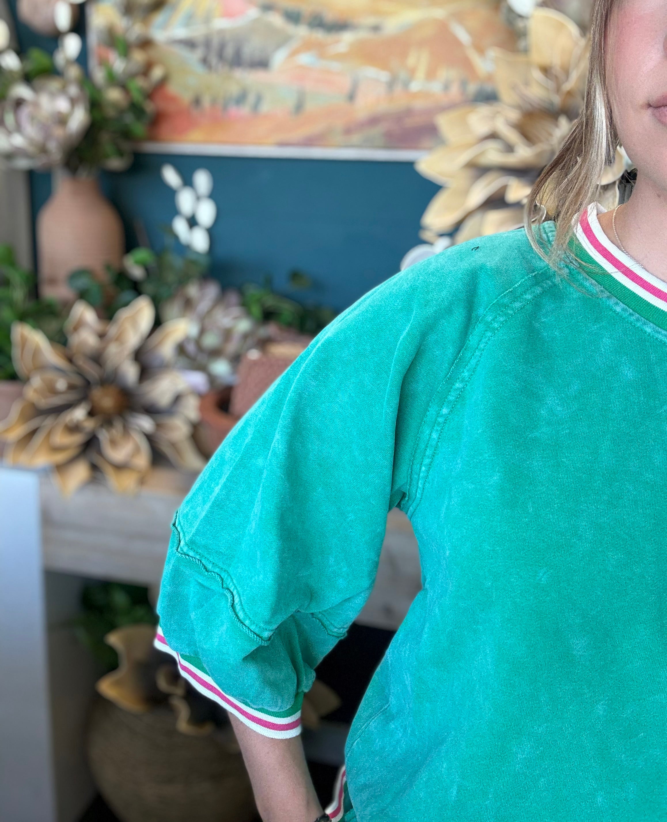 women's green matching short set with balloon sleeves and pink white striped trim