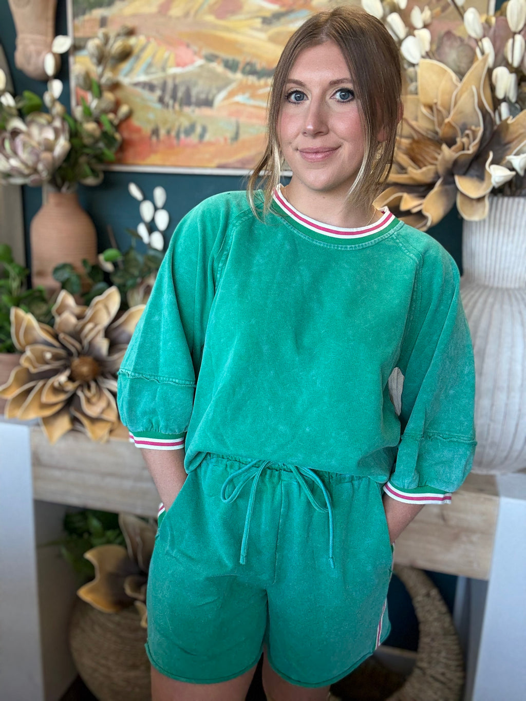 women's green matching short set with balloon sleeves and pink white striped trim