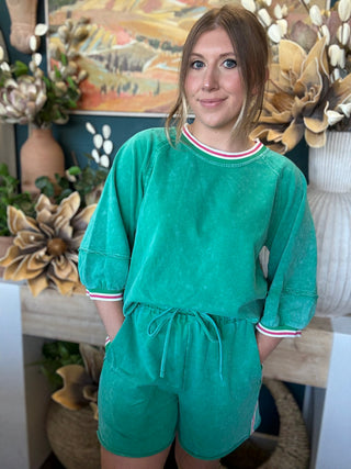 women's green matching short set with balloon sleeves and pink white striped trim