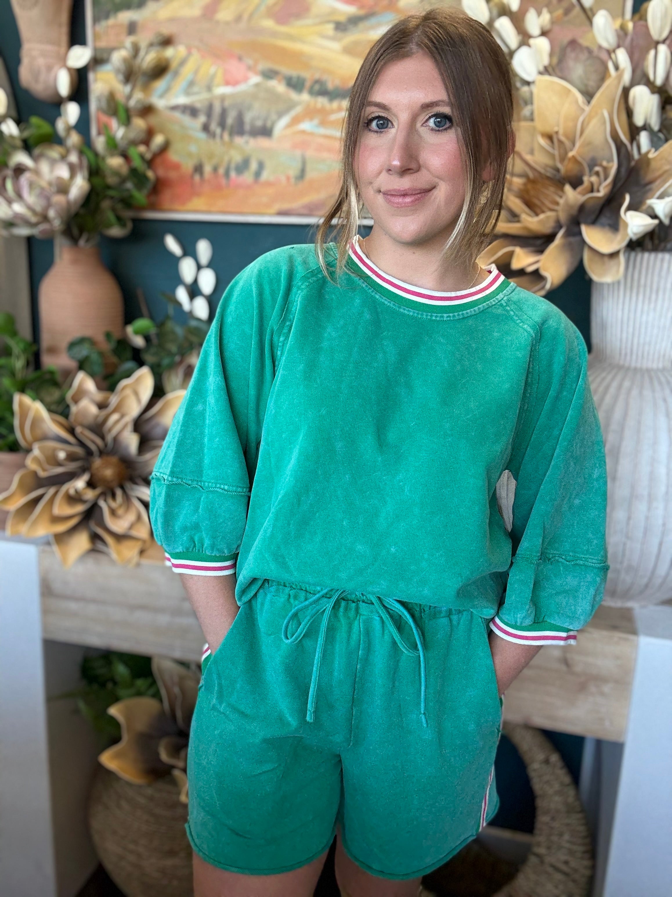 women's green matching short set with balloon sleeves and pink white striped trim