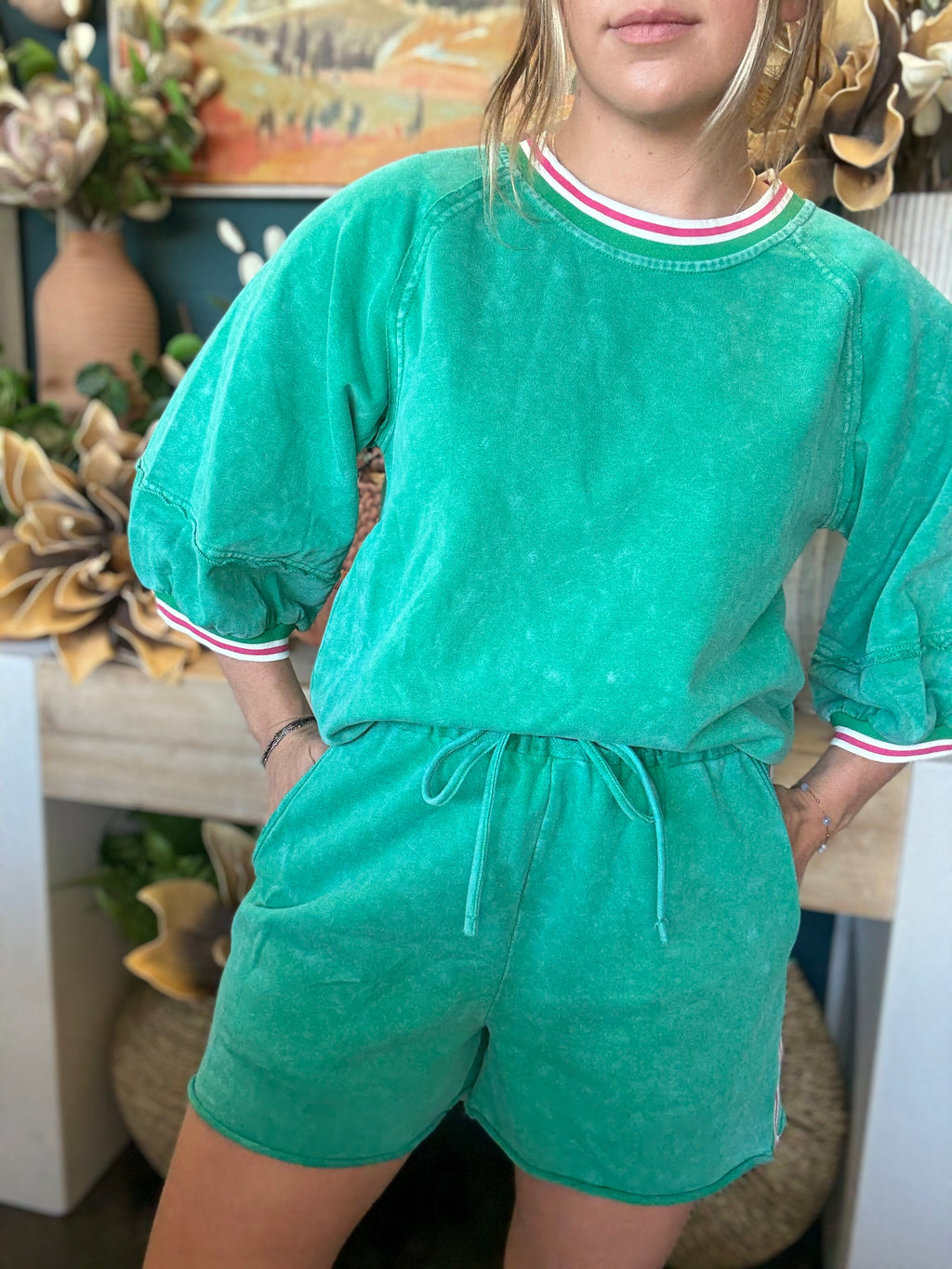 women's green matching short set with balloon sleeves and pink white striped trim