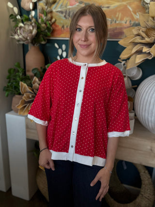 red polka dot oversized button up top with white trim and relaxed fit