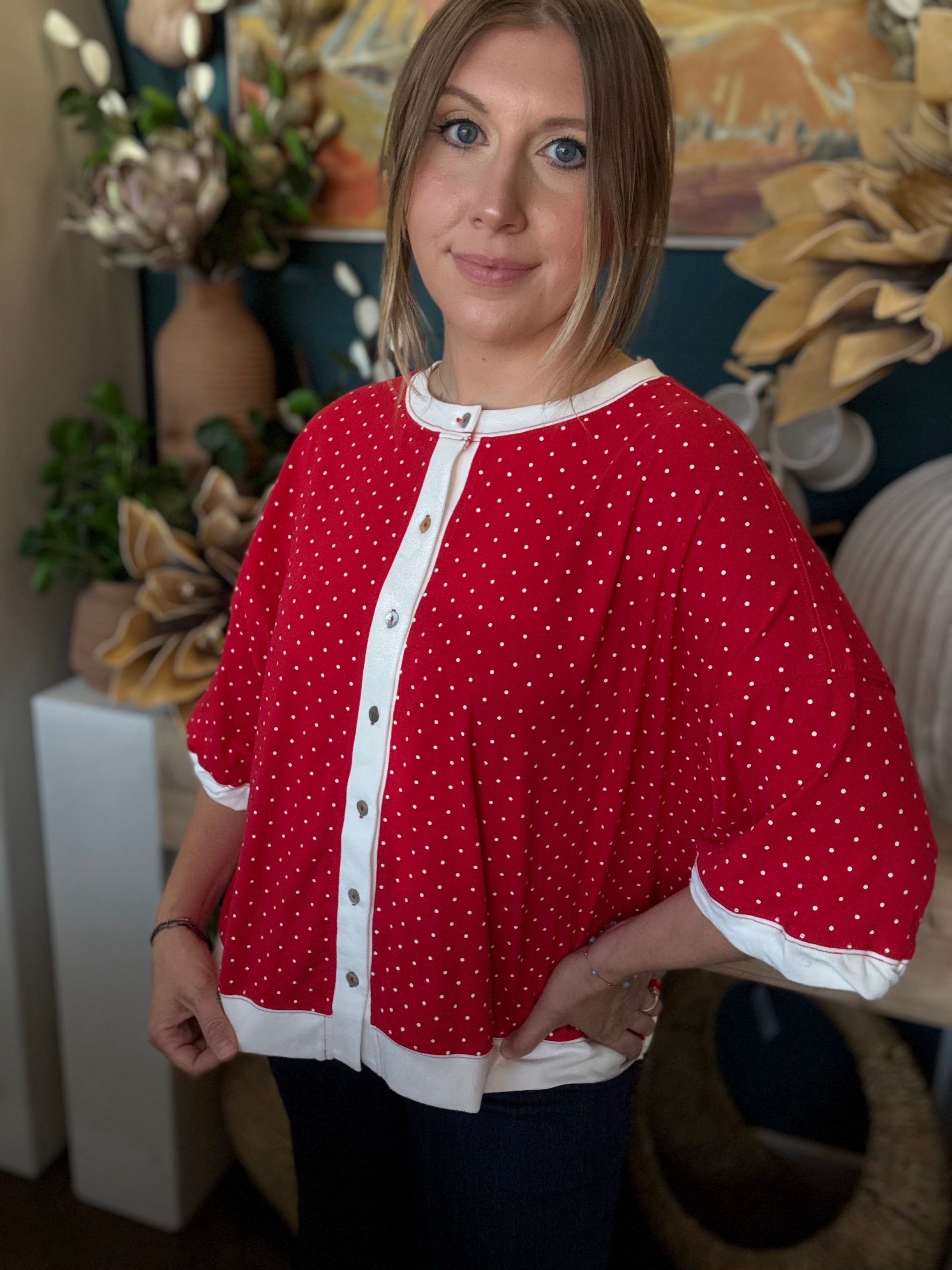 red polka dot oversized button up top with white trim and relaxed fit