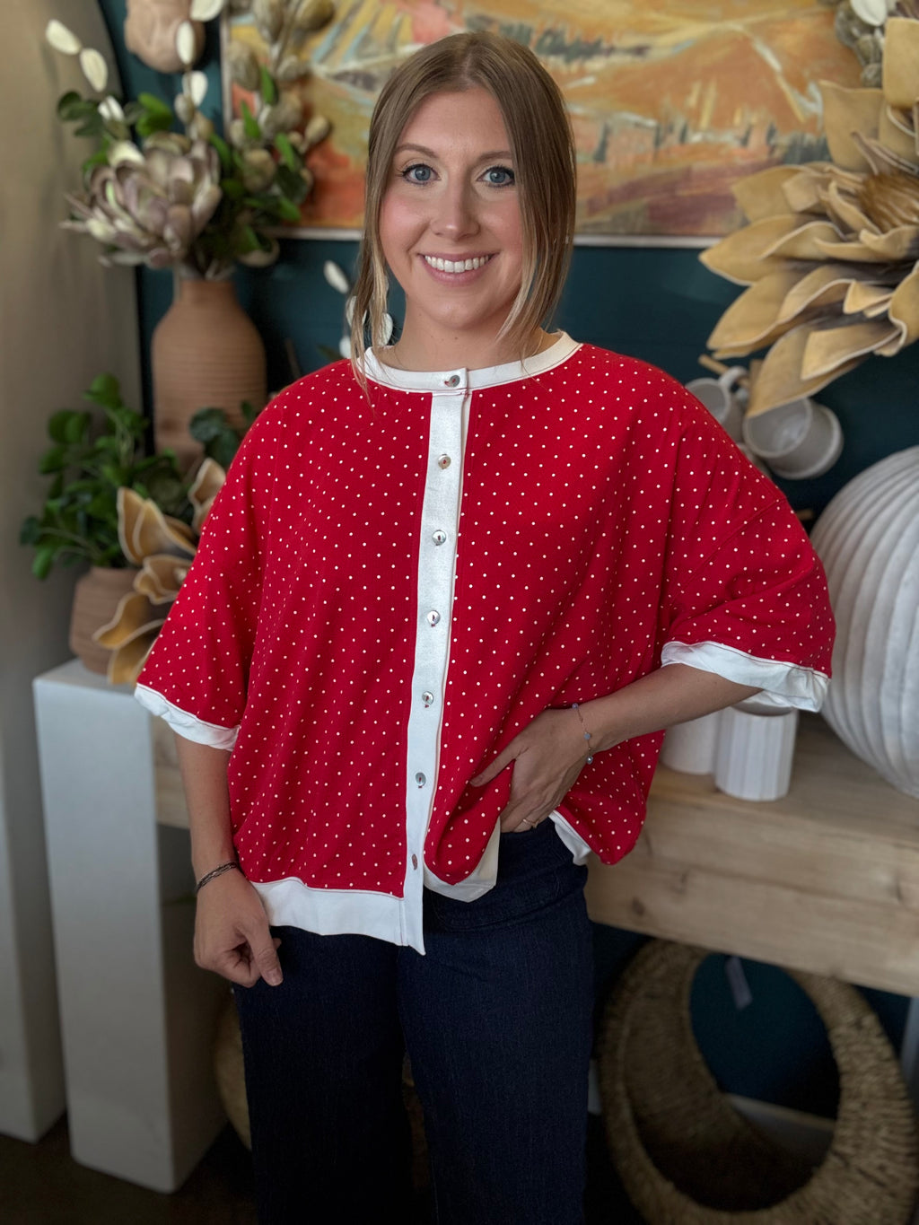 red polka dot oversized button up top with white trim and relaxed fit