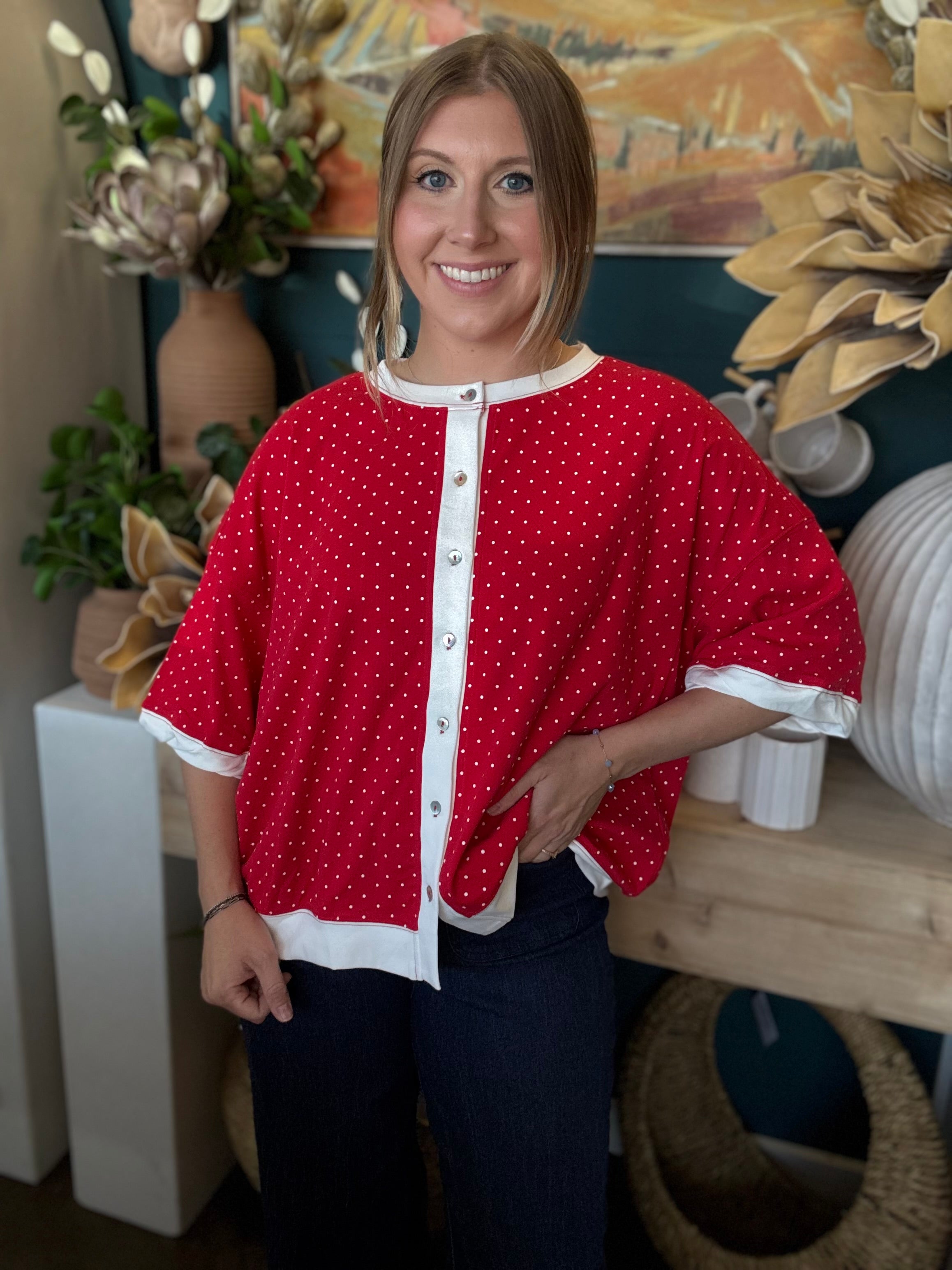 red polka dot oversized button up top with white trim and relaxed fit