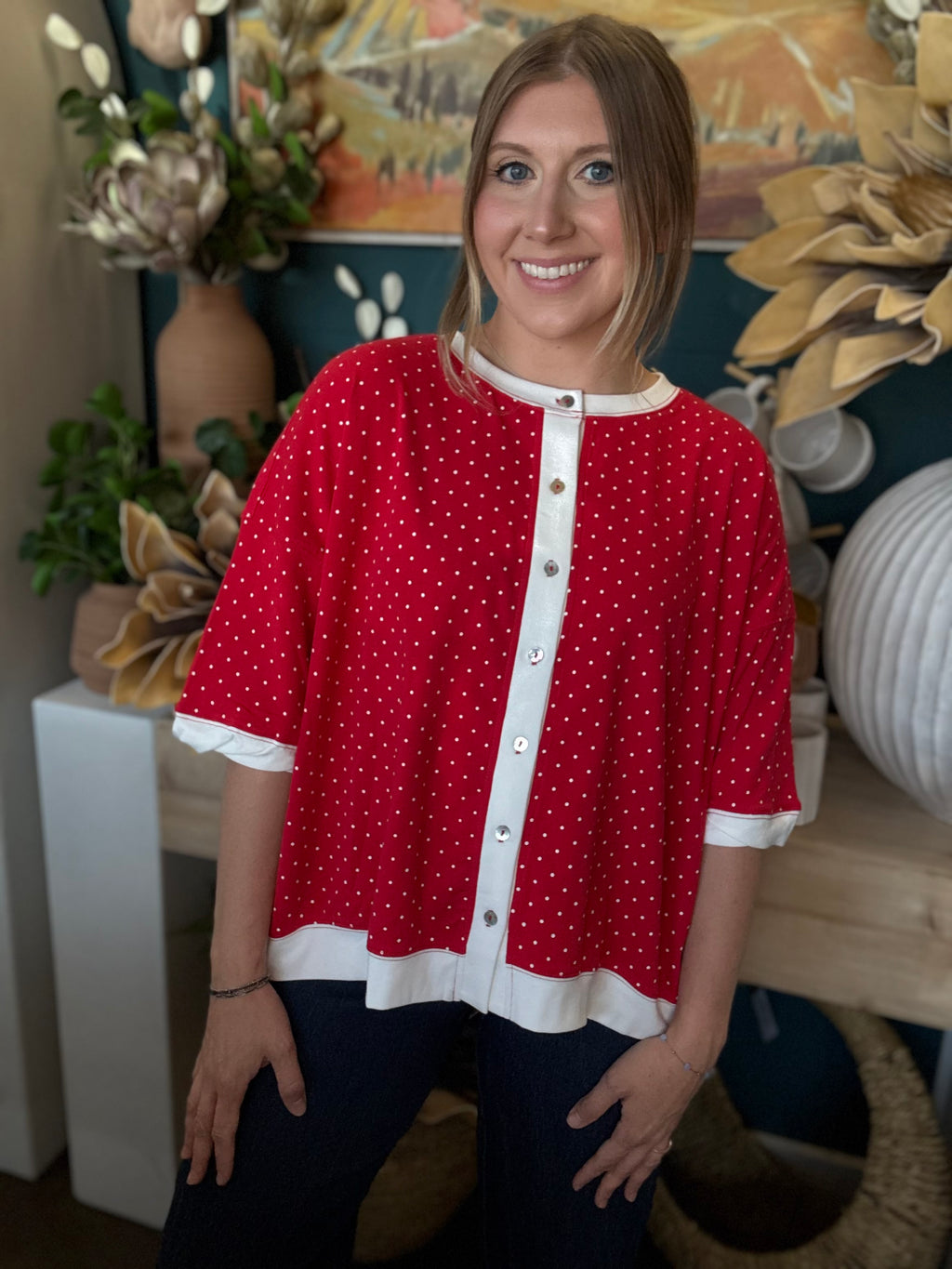 red polka dot oversized button up top with white trim and relaxed fit