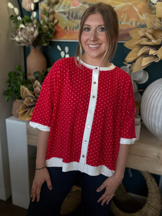 red polka dot oversized button up top with white trim and relaxed fit
