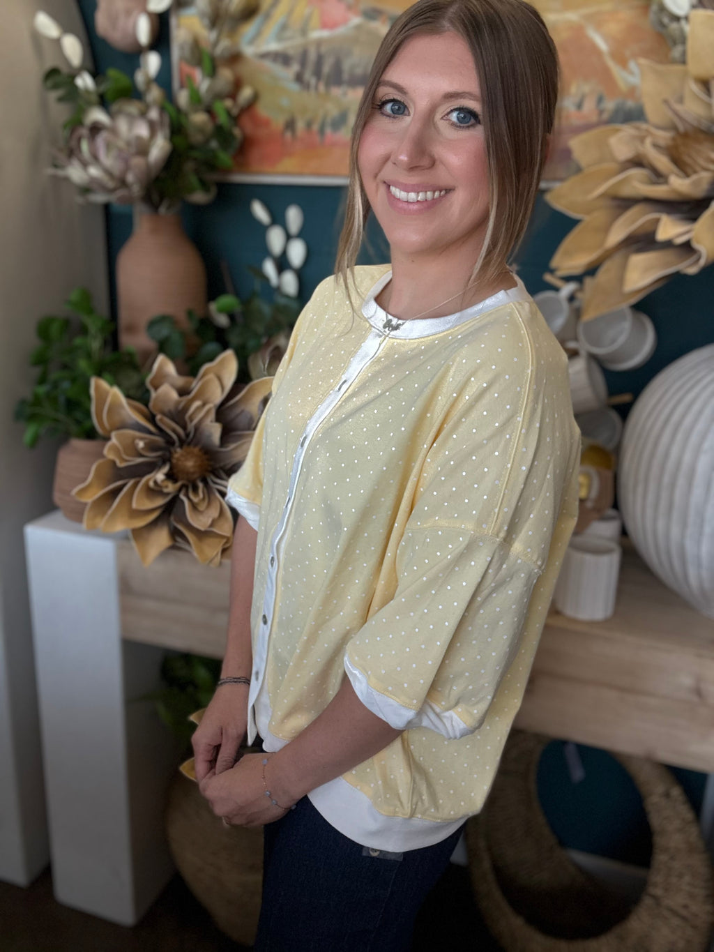 yellow polkadot oversized button up top with balloon sleeves and white trim