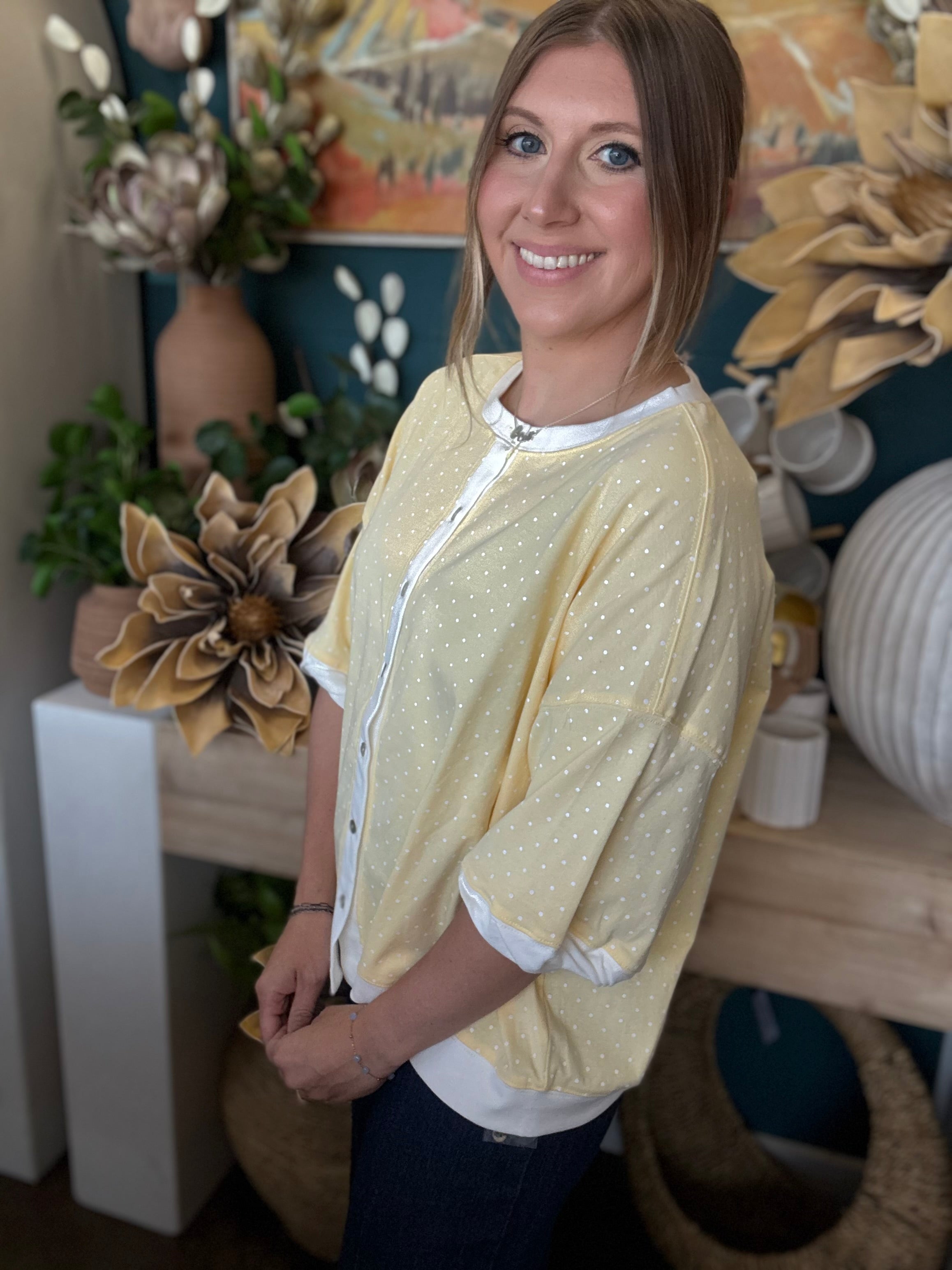 yellow polkadot oversized button up top with balloon sleeves and white trim