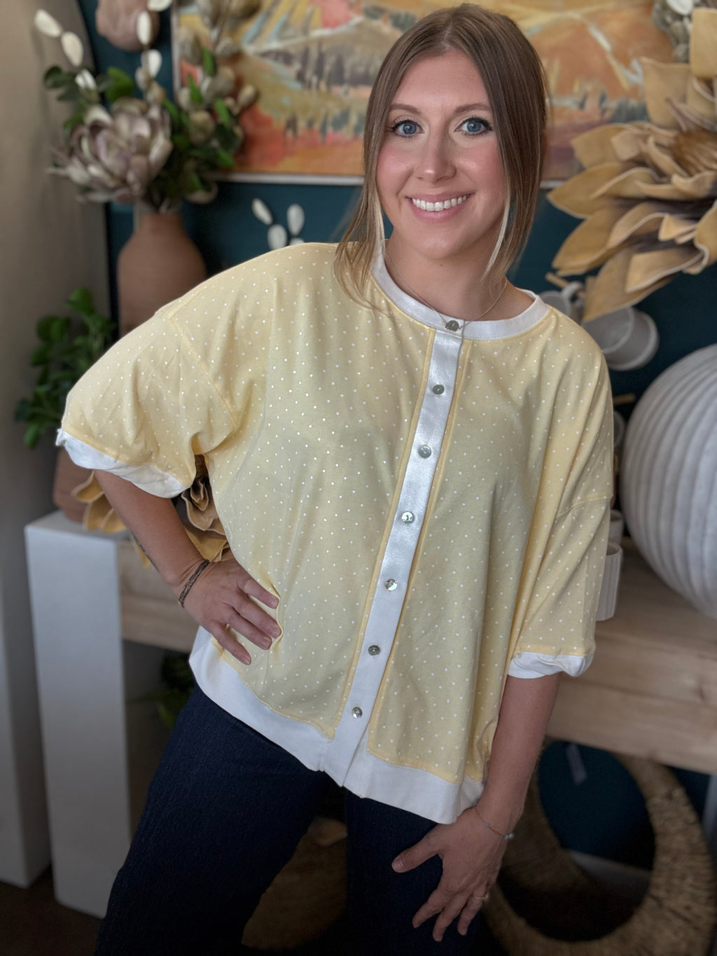 yellow polkadot oversized button up top with balloon sleeves and white trim