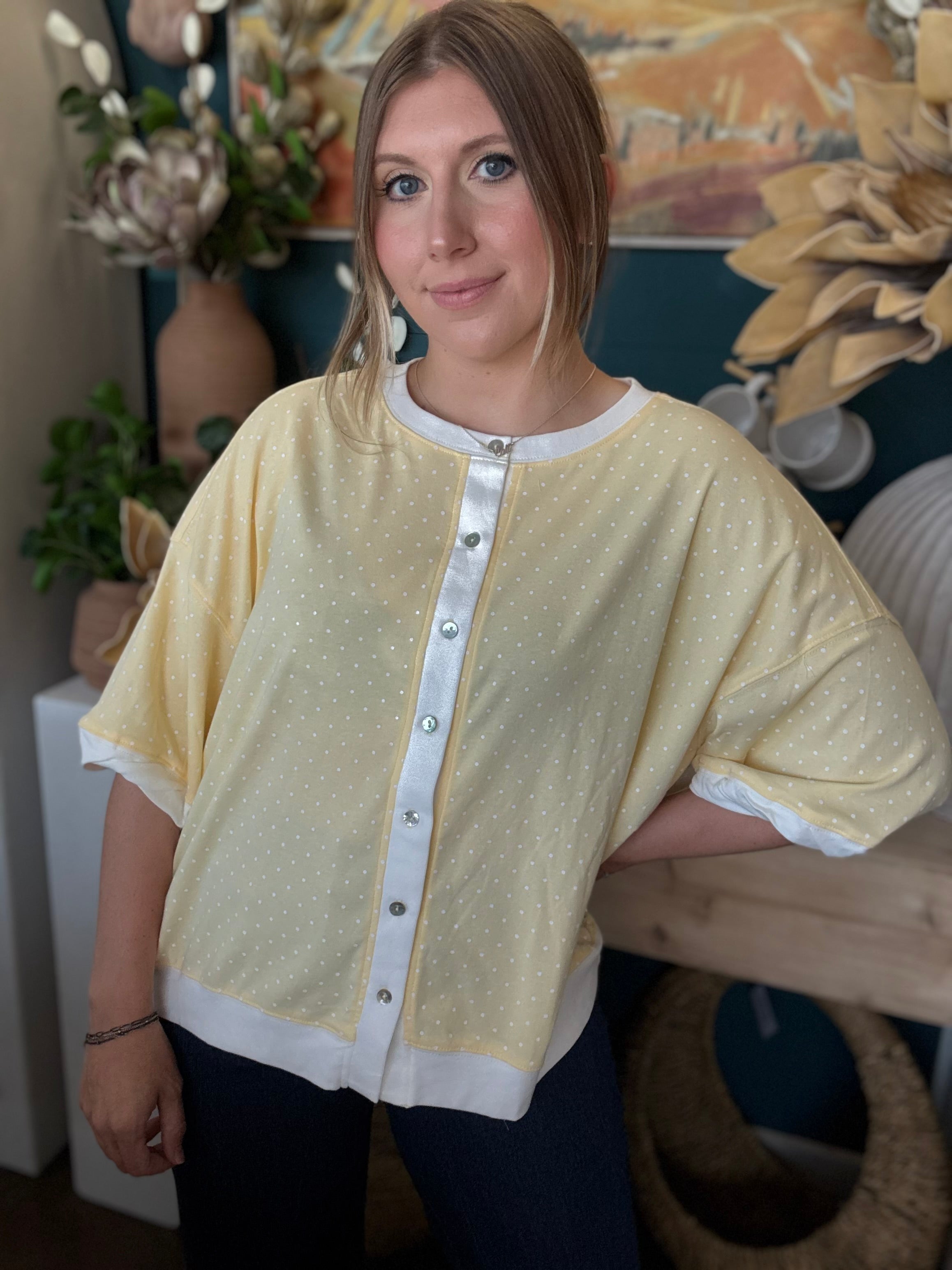 yellow polkadot oversized button up top with balloon sleeves and white trim
