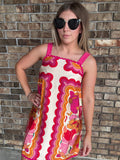 Women's colorful retro floral dress with wide straps and pink rick rack trim