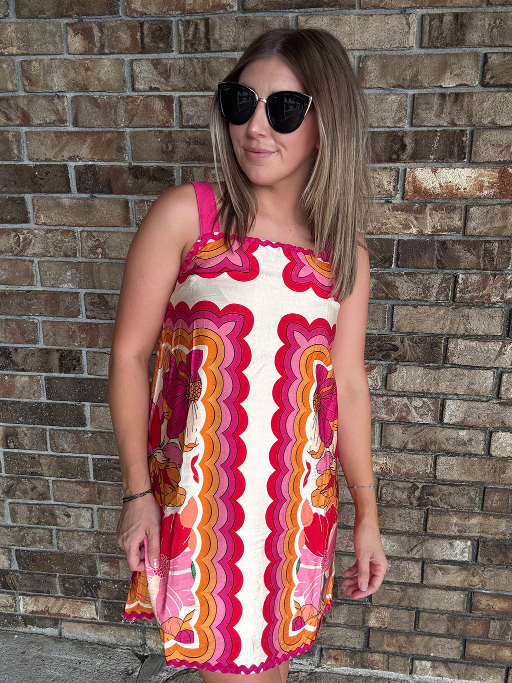 Women's colorful retro floral dress with wide straps and pink rick rack trim