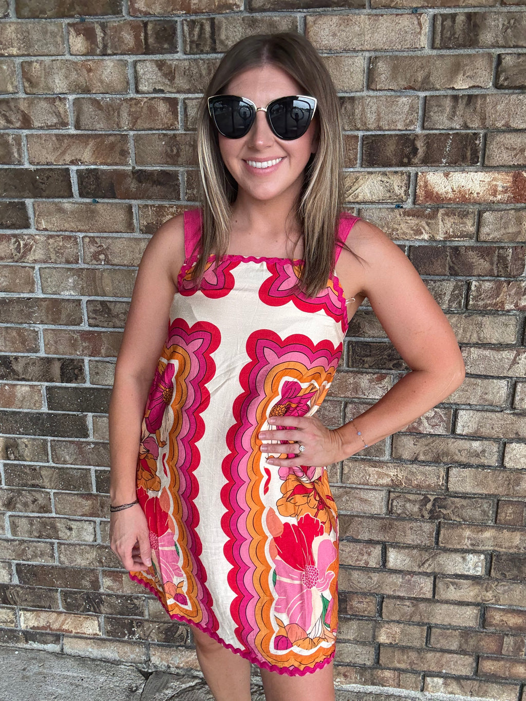 Women's colorful retro floral dress with wide straps and pink rick rack trim