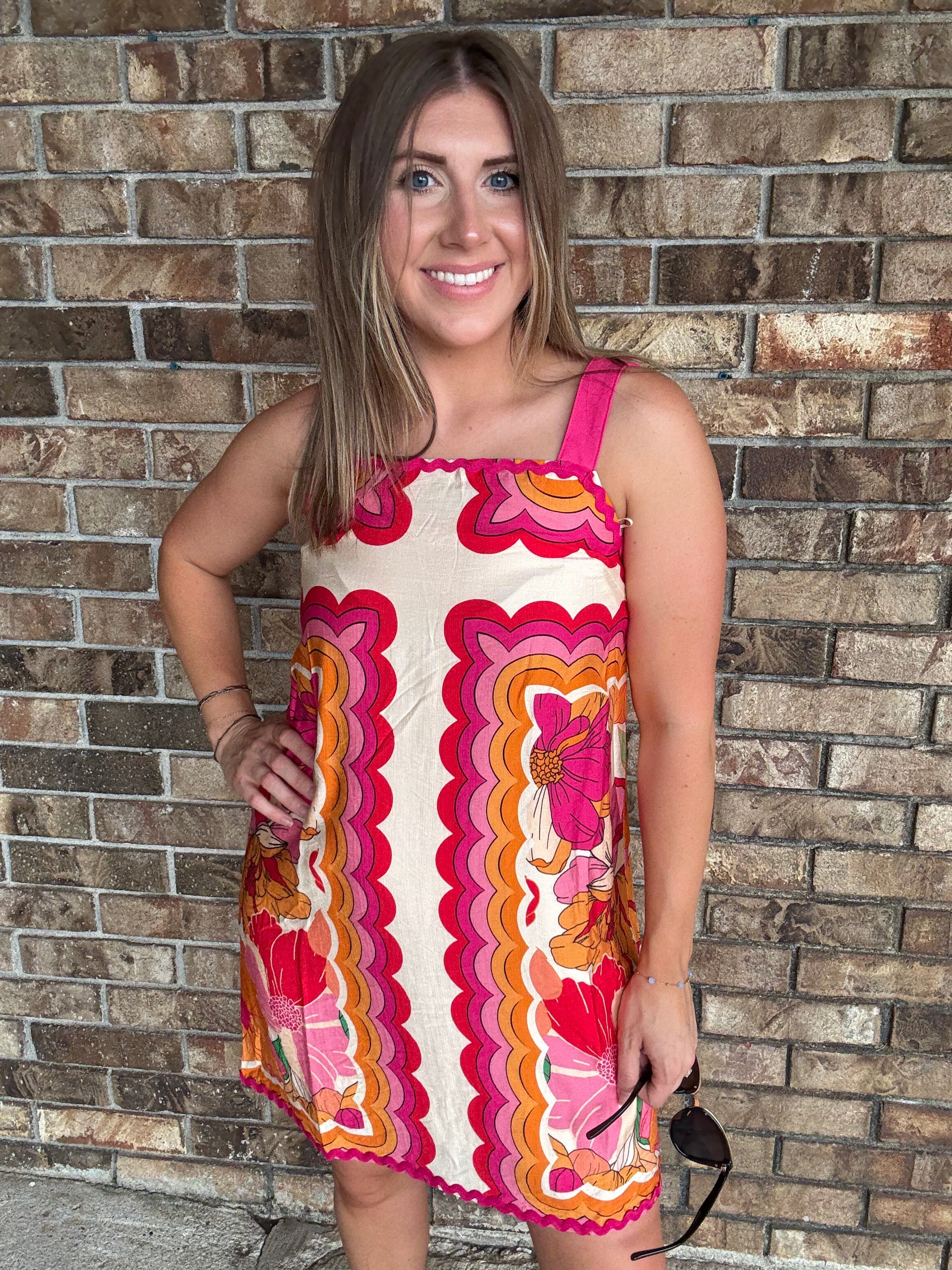 Women's colorful retro floral dress with wide straps and pink rick rack trim