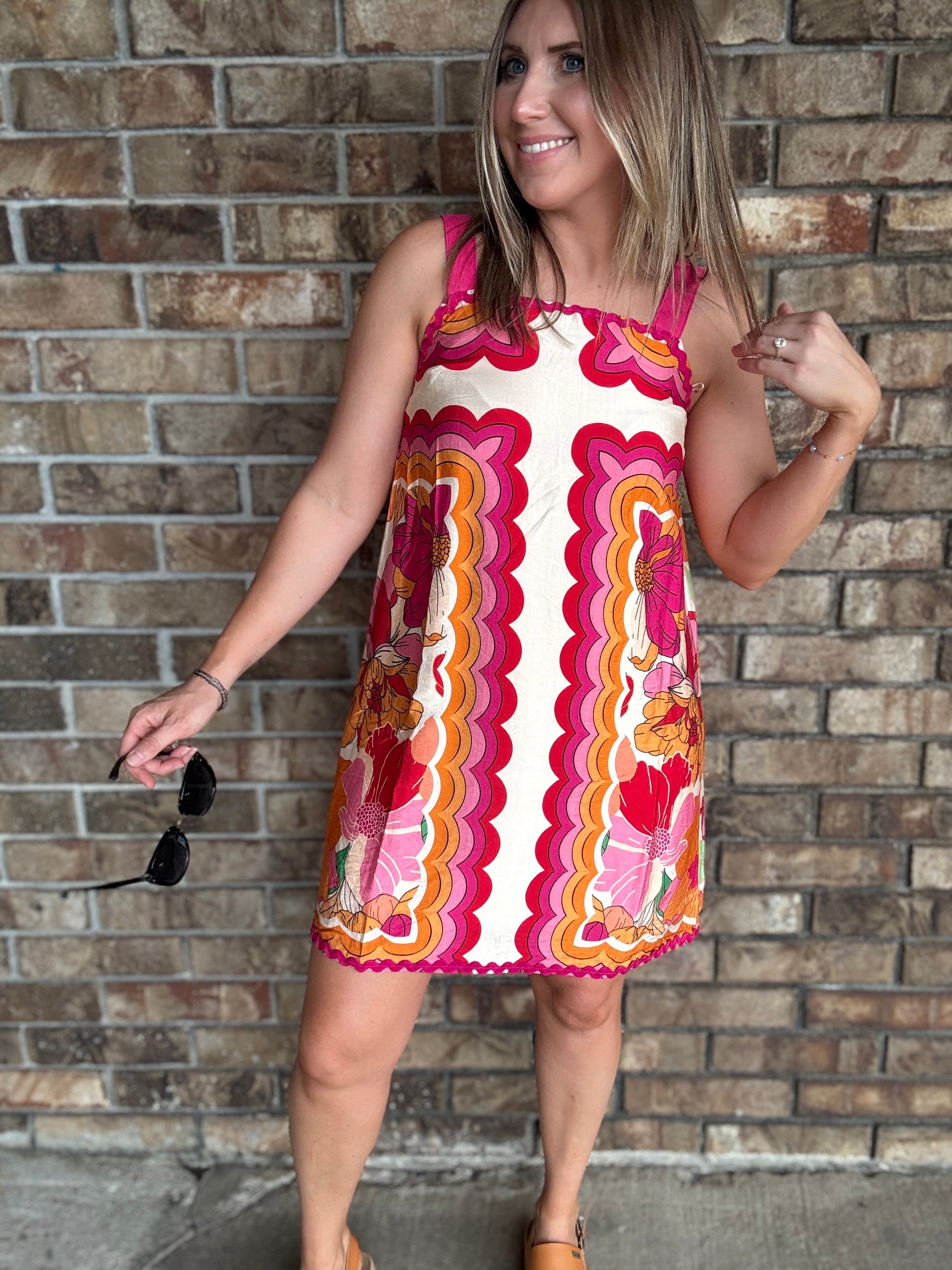 Women's colorful retro floral dress with wide straps and pink rick rack trim