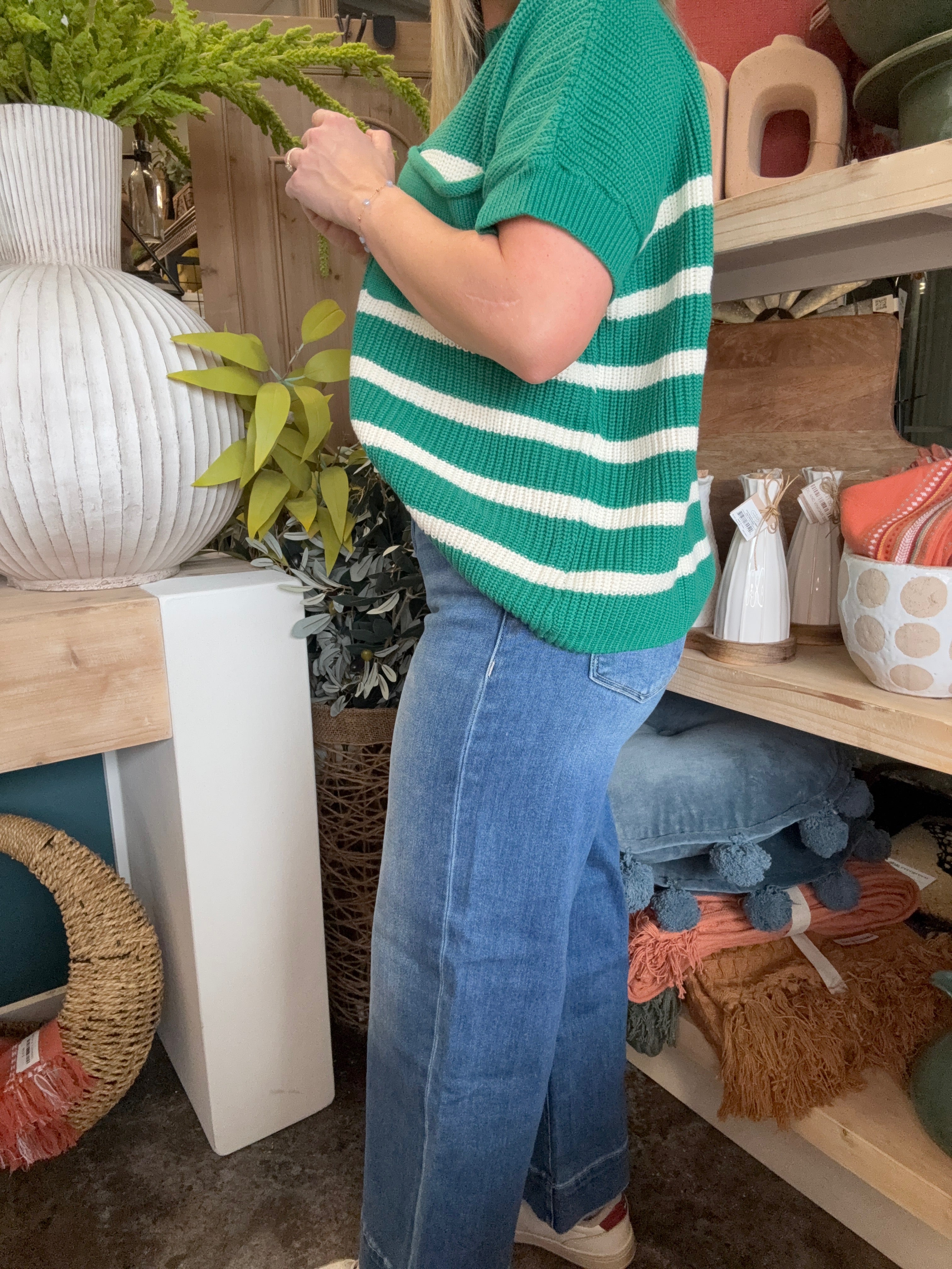 woman wearing high rise wide leg vintage wash boutique jeans