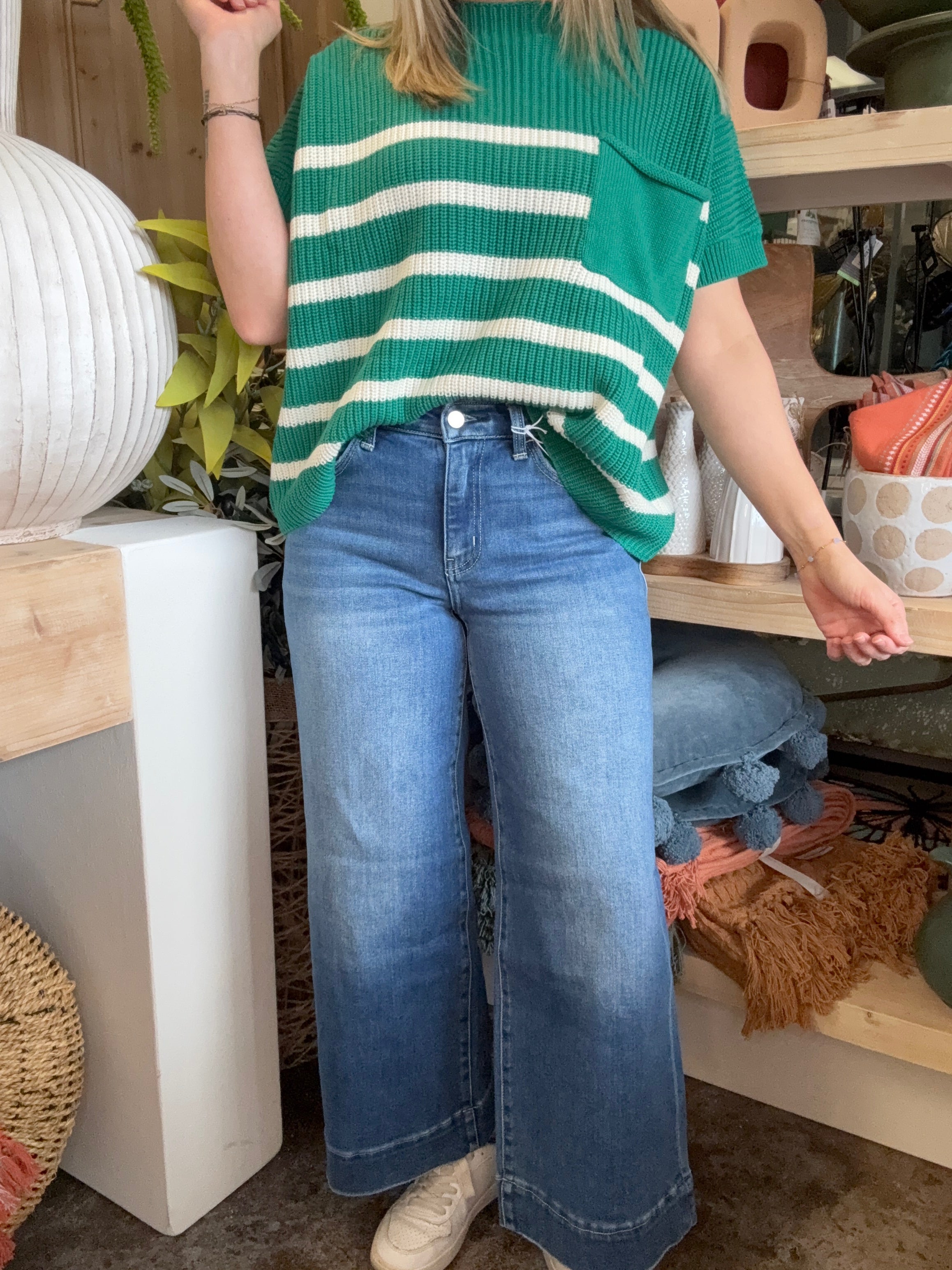 woman wearing high rise wide leg vintage wash boutique jeans