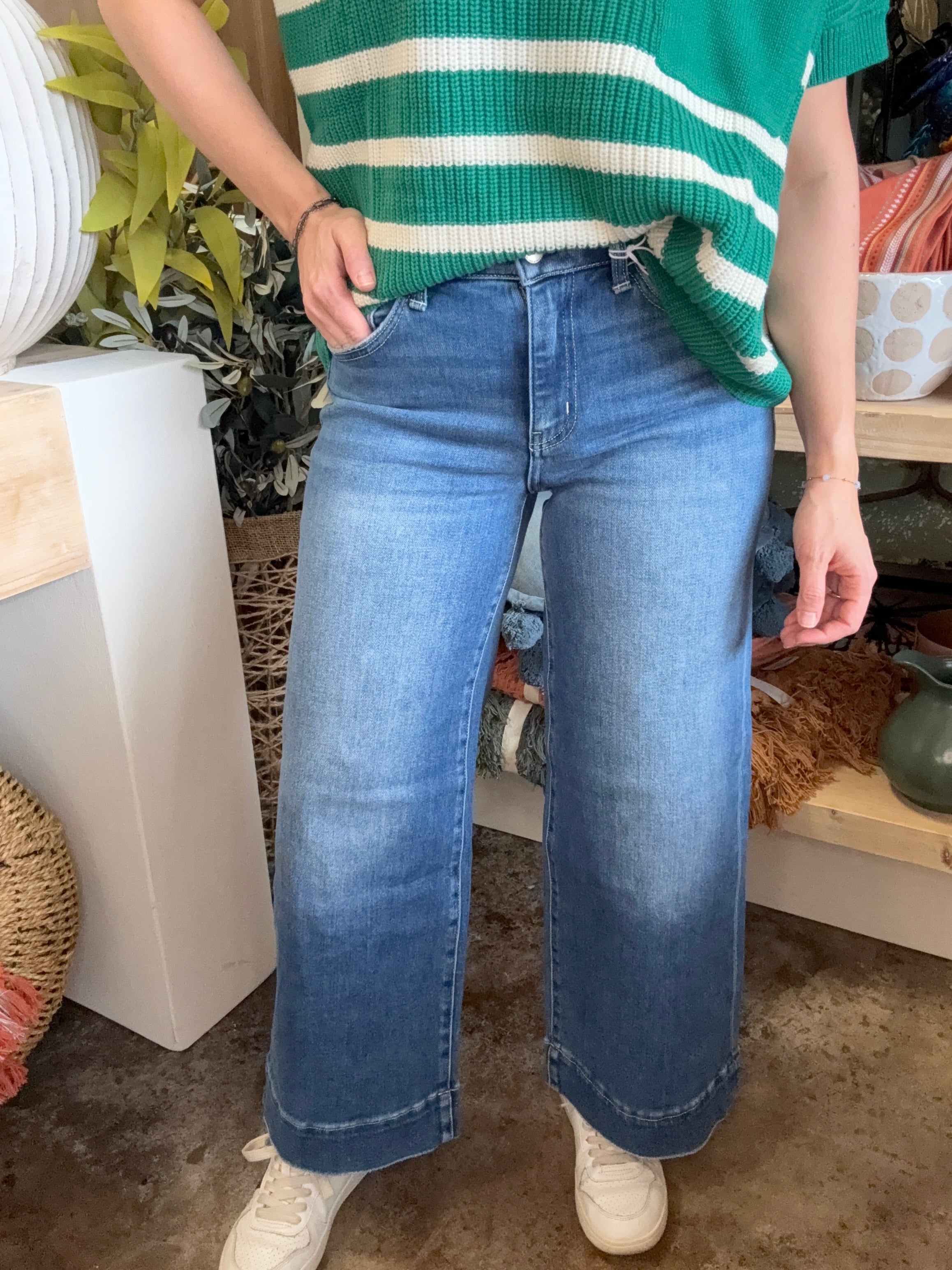woman wearing high rise wide leg vintage wash boutique jeans