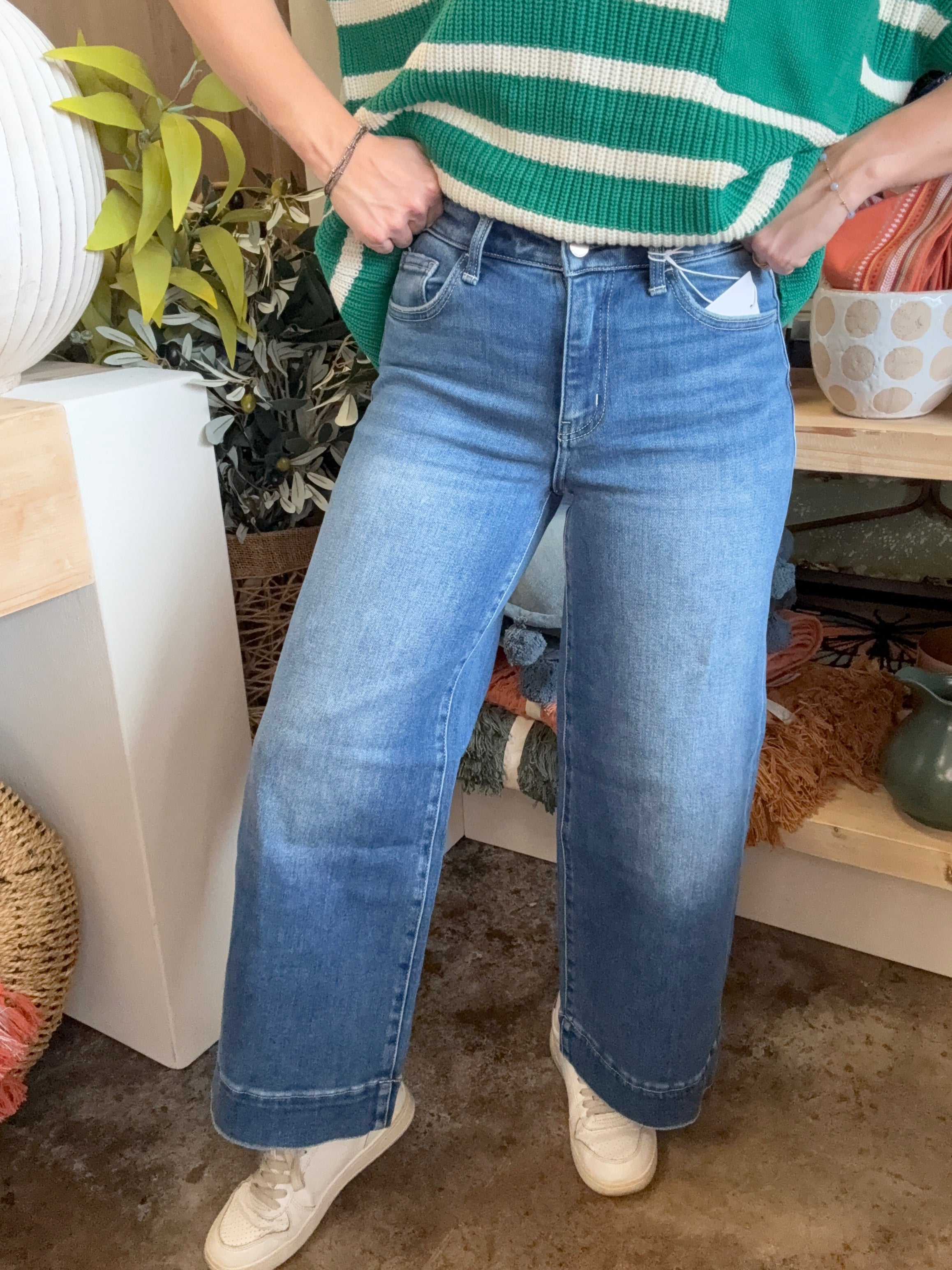 woman wearing high rise wide leg vintage wash boutique jeans