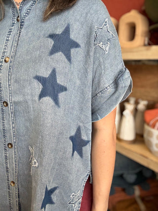 woman wearing vintage star wash denim oversized button-up boutique top
