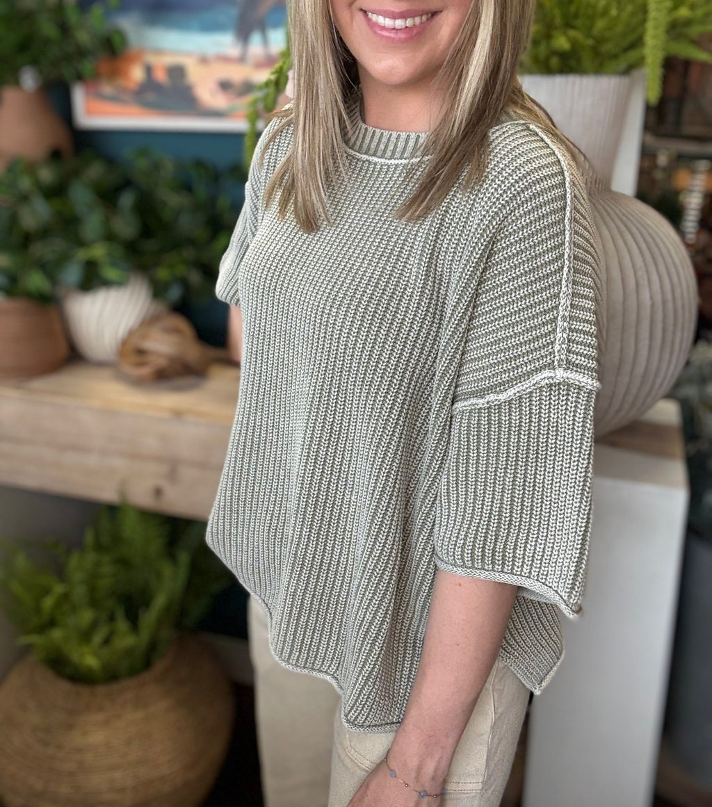 Sage ribbed knit short sleeve boutique top styled with neutral pants at Pill Box Boutique